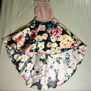 round neck social dress with floral high-low bottom.
